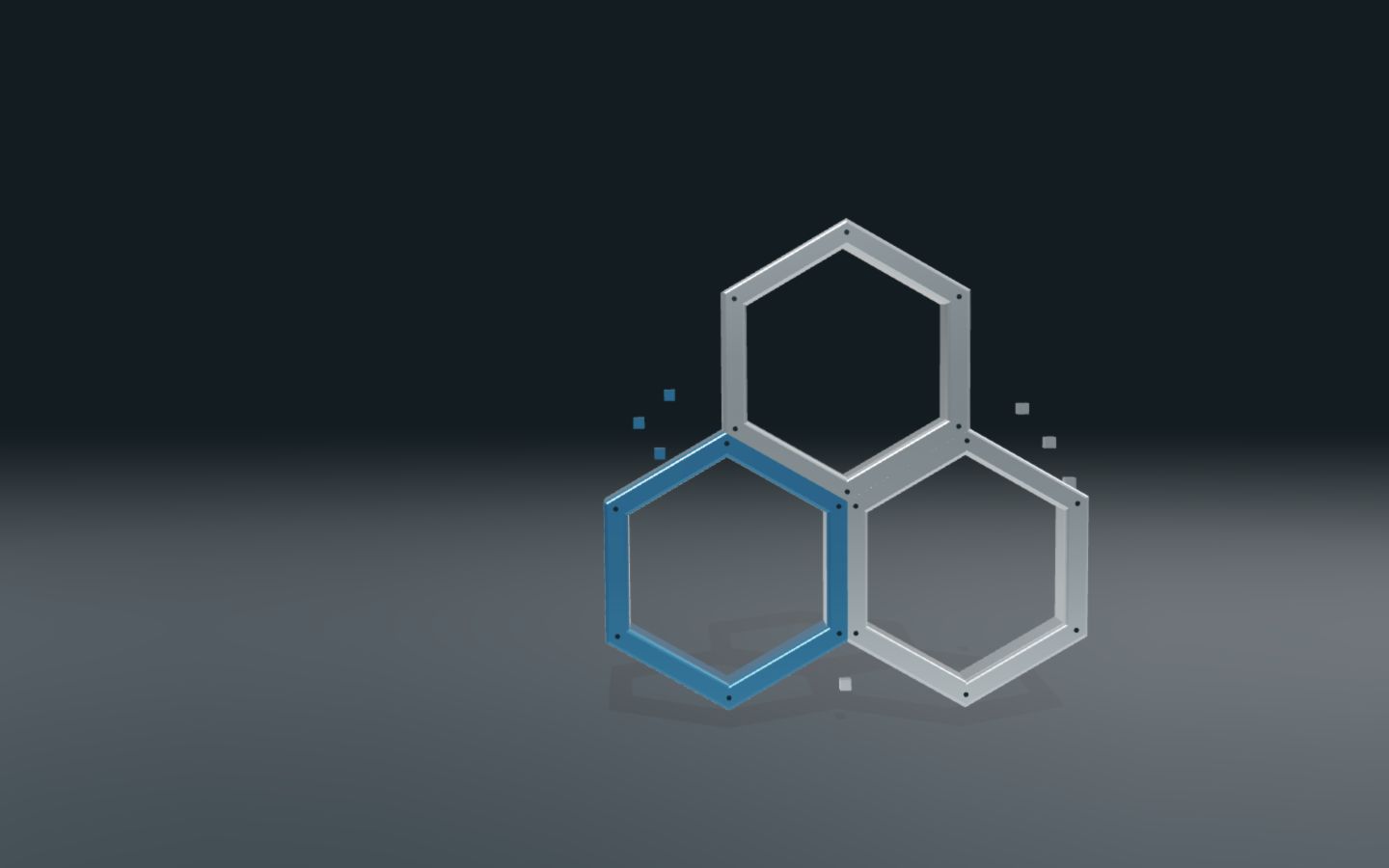 Trion machined-metal hexagons connected in a studio scene